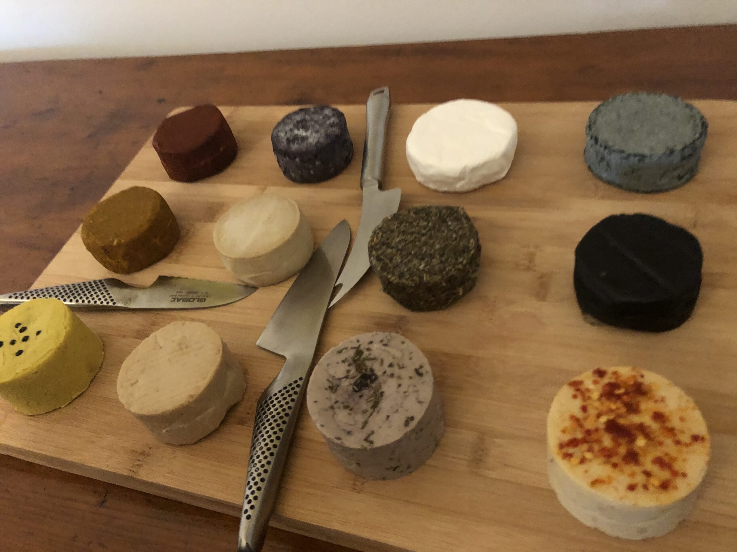 plant based cheese tasting cheese wheels non-dairy cheese